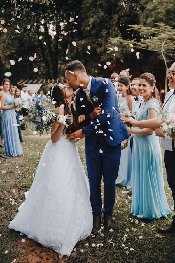 Wedding couple under confetti